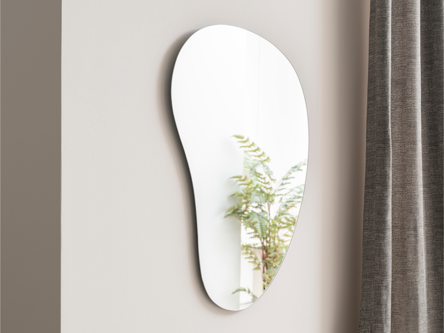 Asimetrik Çerçevesiz Duvar Aynası 85x58